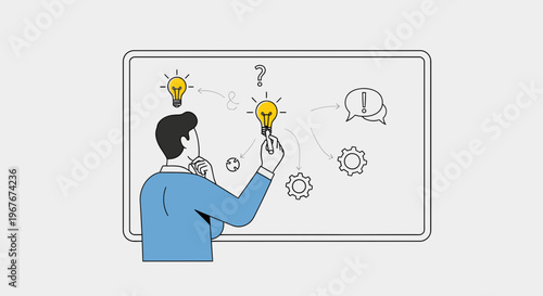 Man drawing light bulb on board.