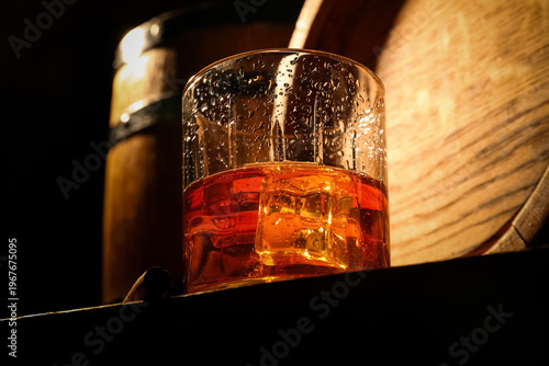 Glass of cold whiskey and o...