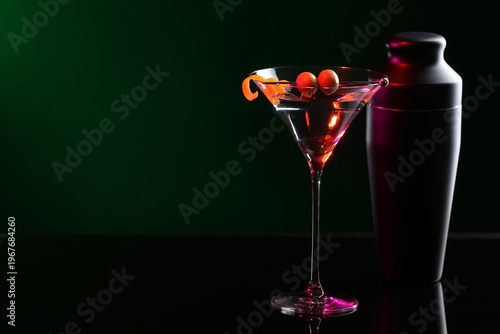 Shaker with glass of tasty ...
