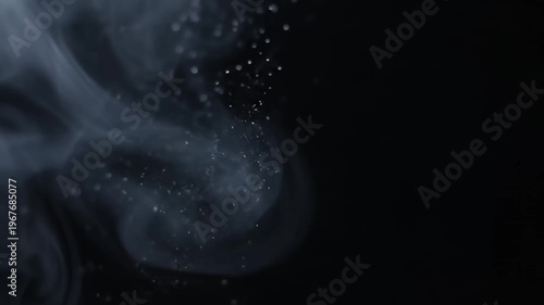 Billowing white vapor against dark mysterious backdrop