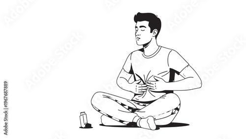Young Man Sitting Cross-Legged and Meditating in a Peaceful Indoor Setting.