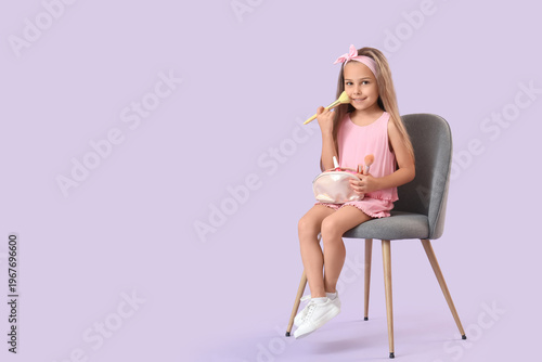Cute little girl with cosme...