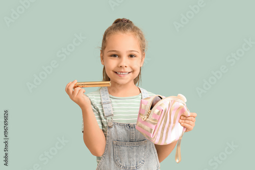 Cute little girl with cosme...