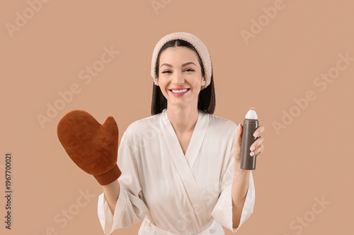 Happy young woman in bathro...