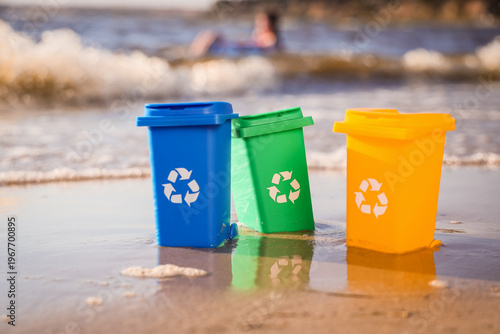 Small trash bins on shore, ...