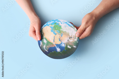 Female hands with paper pla...