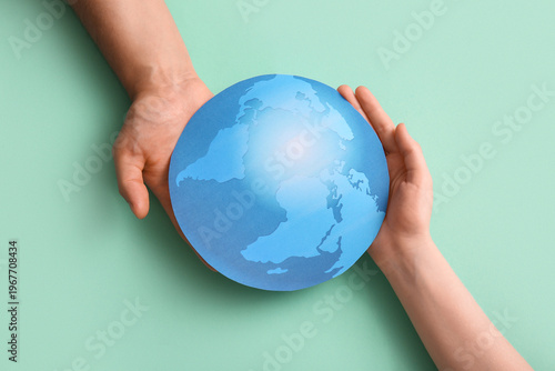 Female hands with paper pla...