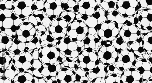 Soccer balls in a pile.
