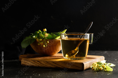 Glass cup of hot linden tea...