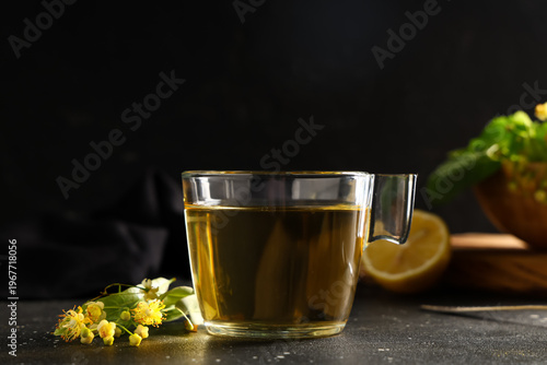 Glass cup of hot linden tea...