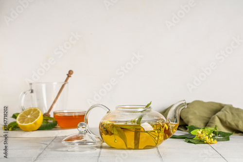 Glass teapot of hot linden ...