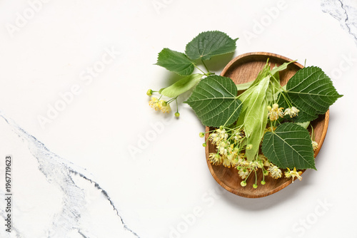 Wooden tray with fresh lind...