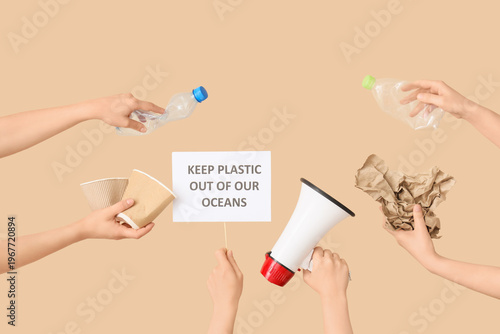 Hands holding paper sheet w...
