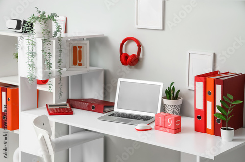 Stylish workplace with mode...