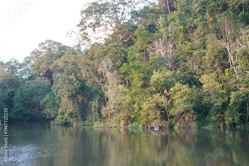 A calm atmosphere at a lake with still water and natural surroundings.