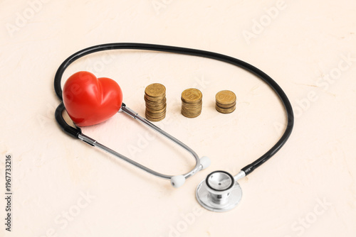 Red heart with coins and st...