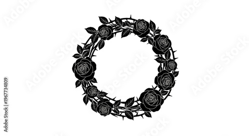 Black floral wreath with roses and thorns.