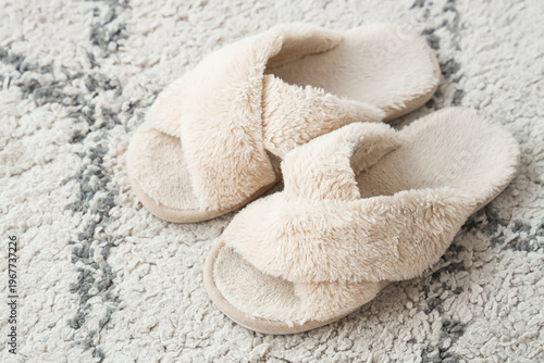 Soft slippers on carpet, cl...
