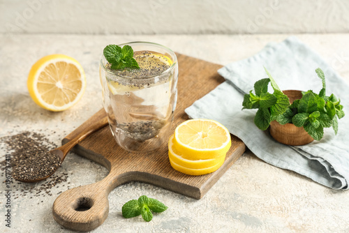 Glass of lemon water with c...