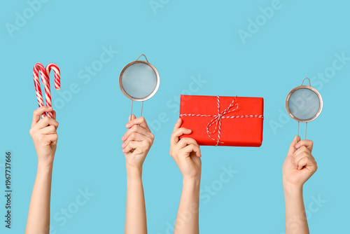 Female hands holding sieves...