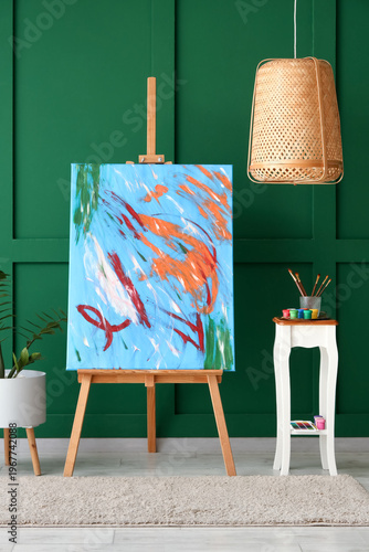 Wooden easel with picture, ...