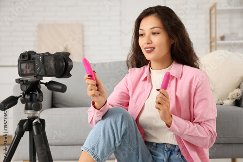 Female Asian blogger with v...