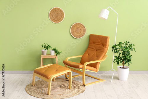 Stylish brown armchair with...