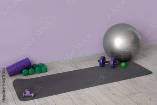 Fitball with sports equipme...