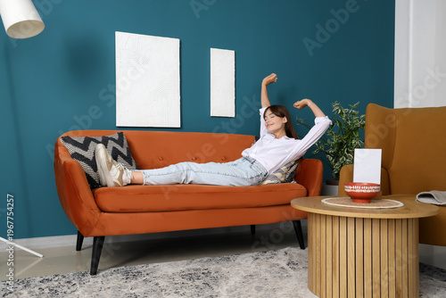 Pretty young woman relaxing...