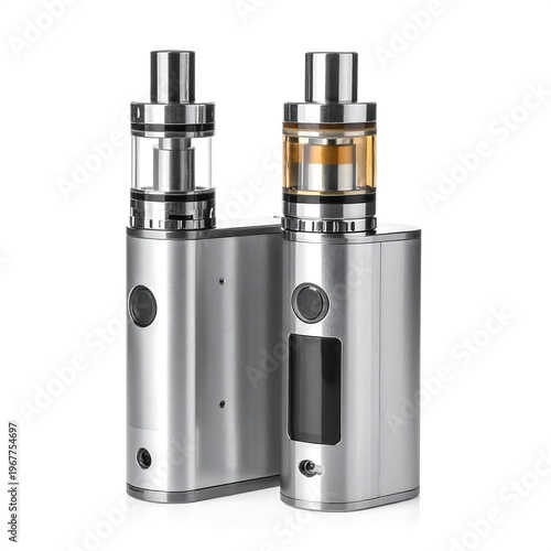 Modern metallic vaping devices, tanks and batteries, on a white backdrop