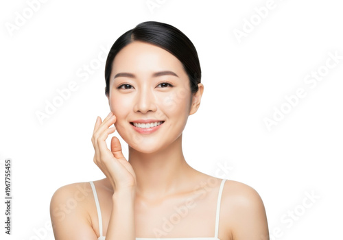 Beautiful asian woman with a gentle smile posing for a portrait in studio lighting