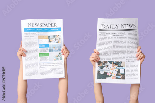 Female hands with newspaper...