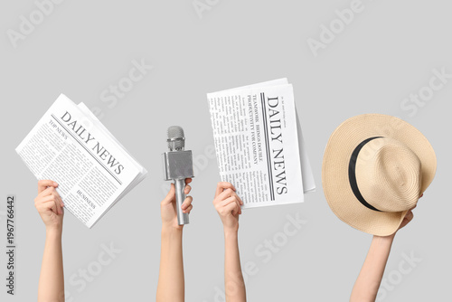 Female hands with newspaper...