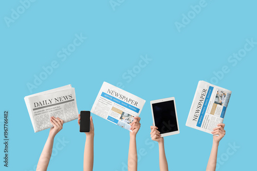 Female hands with newspaper...