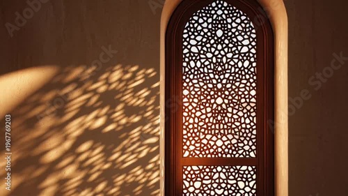 Light shining through ornate window.