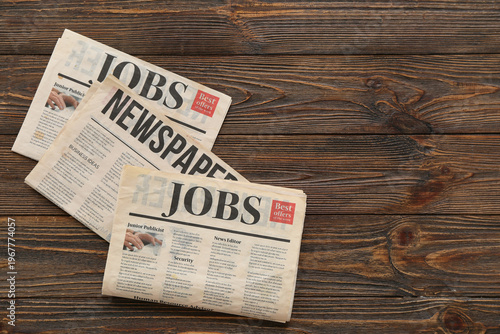 Morning newspapers on woode...