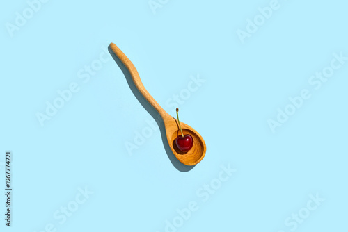 Wooden spoon with sweet che...