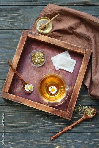 Cup of hot chamomile tea an...