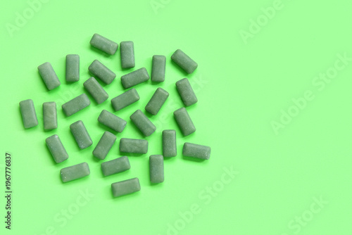 Chewing gums on green backg...