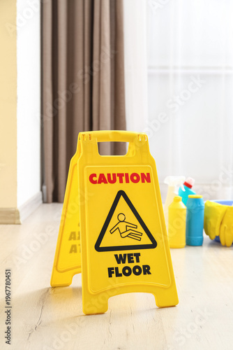 Caution sign on wet floor i...
