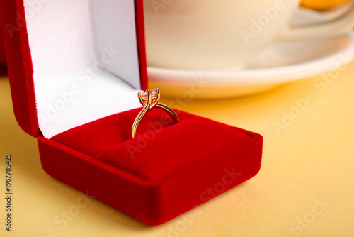 Box with engagement ring an...