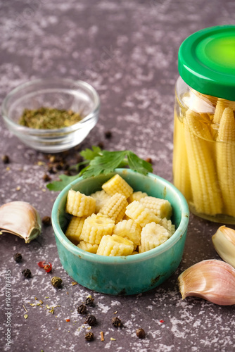 Jar and bowl with canned ba...