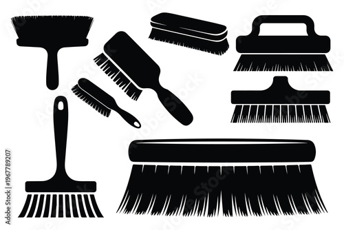 Black silhouettes of various brushes and brooms cleaning tools
