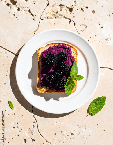 Top view of blackberry and mint toast