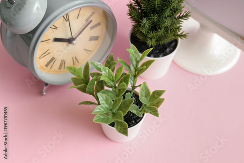 Artificial plants with alar...