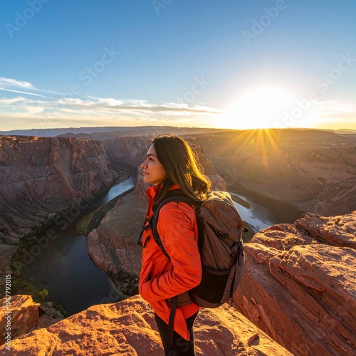 Woman enjoying the sunrise at Horseshoe Bend, Arizona.
