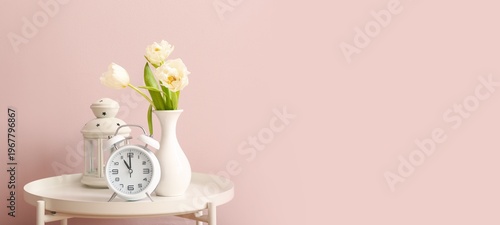 Vase with spring flowers, a...