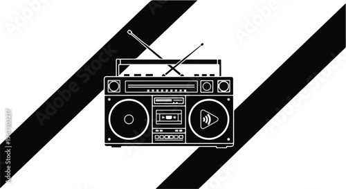 Boombox radio sits centered against a background of bold diagonal black stripes.