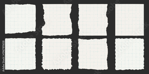 Torn pieces of lined paper arranged on a dark background