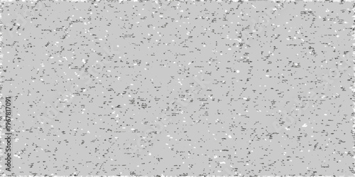 Grainy textured gray background with a speckled distressed appearance